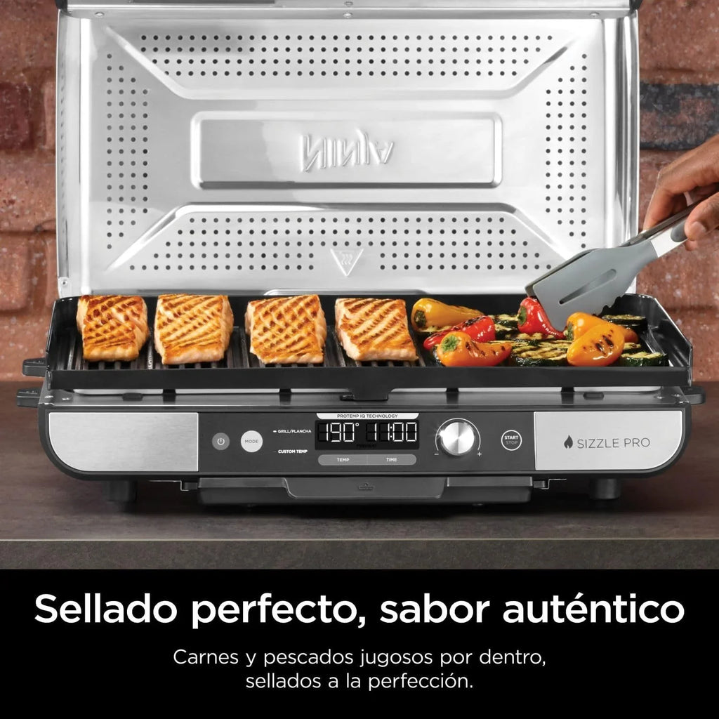 Parrilla y plancha de interior Ninja Sizzle Pro XL con placa y plancha de cerámica antiadherente, tapa desmontable, recolector de grasa y guía de recetas, plata/negro GX101EU 2026
