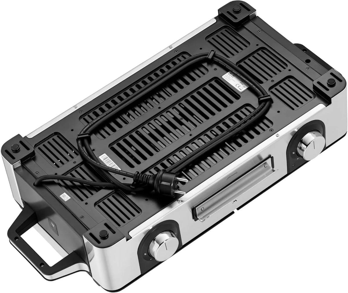 Parrilla eléctrica WMF Lono Master Grill 2026, 50x28 cm, parrilla de mesa eléctrica con paravientos y bandeja recogegrasa, certificada para uso exterior, 2 superficies de cocción ajustables independientemente, 2400 W, acero inoxidable mate.
