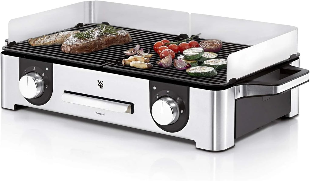 Parrilla eléctrica WMF Lono Master Grill 2026, 50x28 cm, parrilla de mesa eléctrica con paravientos y bandeja recogegrasa, certificada para uso exterior, 2 superficies de cocción ajustables independientemente, 2400 W, acero inoxidable mate.
